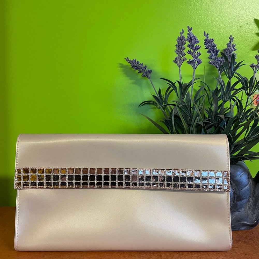 CHRISTIAN DIOR  cosmetic purse with beautiful gold stripe.New